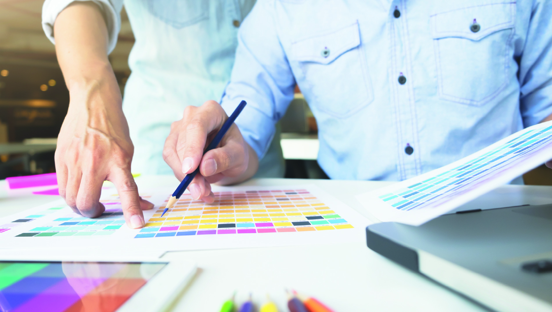 graphic designers working with colour